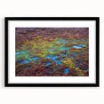 Framed wall art featuring a serene marsh landscape design with lush greenery and a tranquil water body, presented in a sleek black frame with matting. Perfect for nature lovers seeking to enhance home decor with soothing, natural imagery.