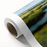 Rolled canvas artwork showcasing a serene marsh landscape with lush greenery and tranquil water reflections, perfect for nature-inspired home decor.