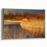 Framed canvas wall art showcasing a serene marsh landscape with vibrant greens and blues, elegantly displayed with a sleek silver frame, perfect for home décor.