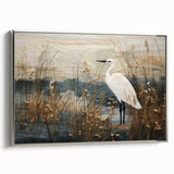 Framed canvas artwork depicting a serene marsh landscape with lush greenery and reflective water, accented by a silver frame, ideal for nature-themed decor.