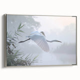 Framed canvas wall art depicting a serene marsh landscape with lush greenery and calm water, featuring a sleek silver frame that enhances the natural beauty of the scene. Perfect for home decor and nature enthusiasts.