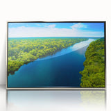 Framed acrylic wall art depicting a serene marsh landscape with vibrant greens and blues, showcasing a tranquil swamp scene ideal for nature lovers and home decor enthusiasts.