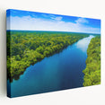 Stretched canvas wall art featuring a serene marsh landscape with lush greenery and reflective water, ideal for nature-themed home decor.
