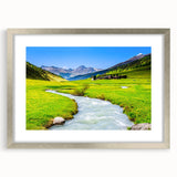 Framed wall art collection showcasing a serene marsh landscape with lush greenery and reflective water, elegantly presented in a silver frame with a mat. Ideal for enhancing home decor with nature-inspired themes.
