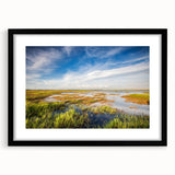 Black-framed wall art collection showcasing a serene marsh landscape with lush greenery and reflections in water, perfect for home decor and nature enthusiasts.