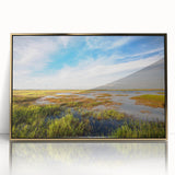 Framed wall art collection showcasing a serene marsh landscape with vibrant greens and earthy browns, accented by a sleek gold frame for elegance.