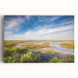 Stretched canvas showcasing a vibrant marsh landscape with lush greenery and tranquil water, ideal for nature-inspired decor and wall art enthusiasts.