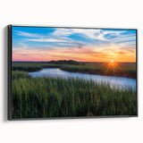 Framed canvas wall art showcasing a serene marsh landscape with vibrant greens and blues, elegantly displayed with a sleek black frame, ideal for nature enthusiasts.
