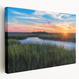 Stretched canvas wall art featuring a serene marsh landscape with lush greenery and tranquil water reflections, perfect for nature-themed decor.