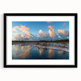 Framed wall art showcasing a serene marsh and swamp landscape design, featuring a black frame and mat, ideal for enhancing home decor with nature-inspired aesthetics.