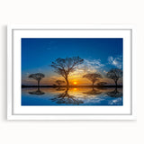 Framed wall art featuring a serene marsh landscape design, showcasing lush greenery and tranquil water reflections, set in a white mat for a modern aesthetic.