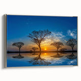 Framed canvas wall art featuring a serene landscape of a marshy swamp, showcasing vibrant greens and blues, set in a stylish silver frame for a modern touch.