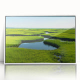 Framed wall art collection showcasing a serene marsh landscape with vibrant greens and blues, designed for modern home decor, enhancing interior aesthetics.