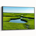 Framed canvas artwork showcasing a serene marsh landscape with lush greenery and tranquil water, designed for wall decor in modern interiors.