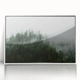 Framed acrylic wall art design showcasing a serene misty landscape with soft fog, featuring a white frame that enhances the calming aesthetic, ideal for home decor.