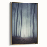 Framed canvas artwork depicting a serene landscape shrouded in mist and fog, featuring a gold frame that enhances its elegance, perfect for modern decor.