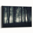 Framed canvas wall art featuring a misty landscape design, showcasing muted colors of gray and blue with a sleek black frame, ideal for modern decor.
