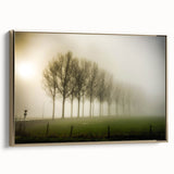 Framed canvas wall art showcasing a serene landscape design with misty fog and soft colors, set against a gold frame, perfect for elevating home decor.