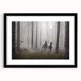 Framed wall art featuring a misty landscape design in a sleek black frame, showcasing serene hues of gray and blue, perfect for modern home decor.