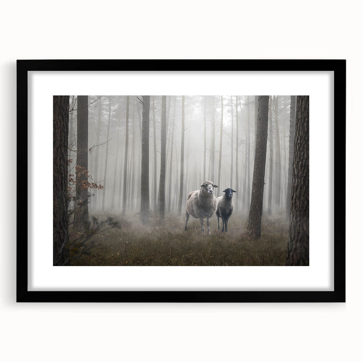 Framed wall art featuring a misty landscape design in a sleek black frame, showcasing serene hues of gray and blue, perfect for modern home decor.