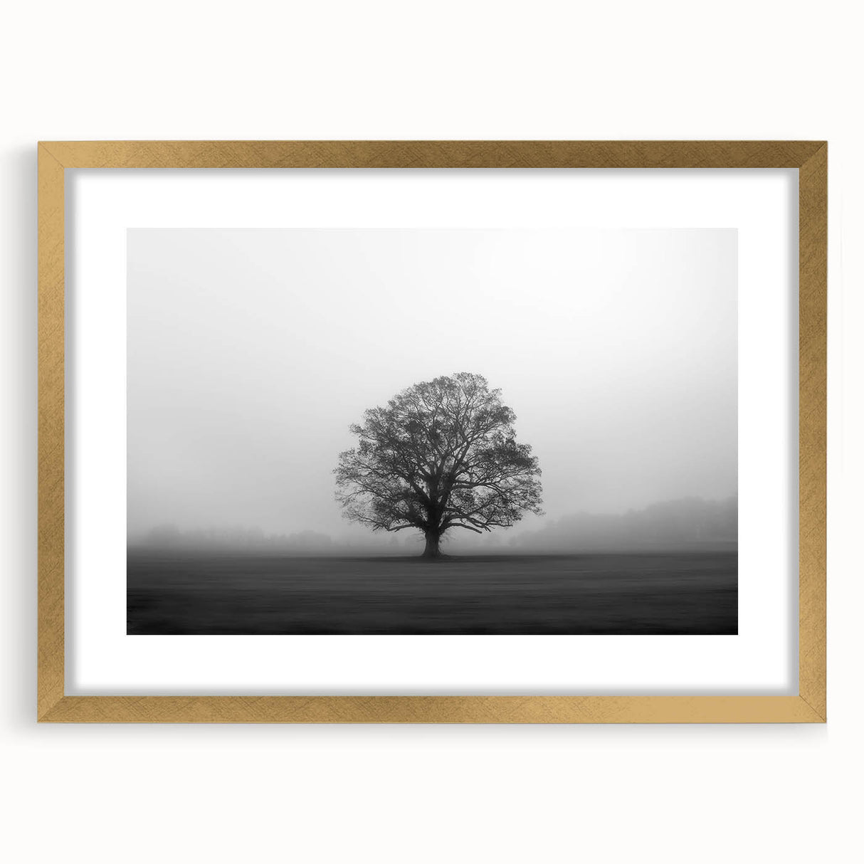 Elegant framed wall art collection showcasing a misty landscape design with a gold mat and frame, perfect for enhancing modern home decor.