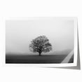 Rolled print of a serene landscape with mist and fog, showcasing soft hues of blue and gray, ideal for enhancing home decor in a calming environment.