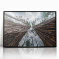 Framed wall art collection showcasing a serene landscape design with mist and fog, featuring a sleek black frame for a modern aesthetic, ideal for home decor.