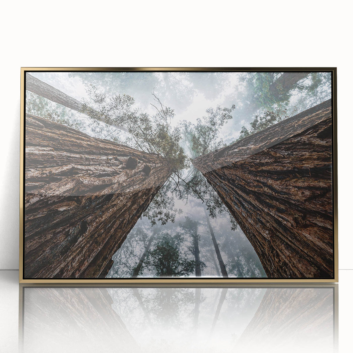Framed acrylic wall art showcasing a misty landscape design, featuring soft gray and gold hues, perfect for modern home decor. Ideal for enhancing living spaces with a serene aesthetic.