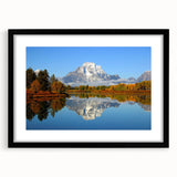 Framed landscape wall art collection showcasing majestic mountains in vibrant colors, featuring a sleek black frame and mat. Ideal for home decor enthusiasts.