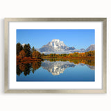 Framed landscape wall art featuring majestic mountains, silver matting, and sleek design, perfect for enhancing home decor with a touch of nature.
