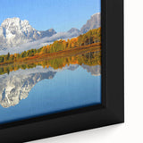 Framed canvas wall art showcasing a serene mountain landscape with vibrant colors and intricate details, designed to enhance any modern decor.
