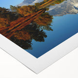 Vibrant rolled canvas showcasing a stunning mountain landscape design, ideal for wall art decor, featuring rich hues of blue and green, packaged securely in a tube.