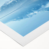 Colorful rolled canvas wall art showcasing a serene mountain landscape design, perfect for home decoration, presented in a protective cardboard tube.