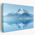 Stretched canvas wall art depicting a serene mountain landscape with rich green valleys and a clear blue sky, ideal for home decor and nature lovers.