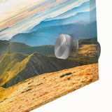 Close-up of an acrylic glass wall art piece showcasing a stunning mountain landscape design, featuring vivid colors and intricate details, perfect for home decor.