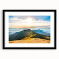 Framed wall art featuring a stunning mountain landscape design, set in a sleek black frame with a white mat, ideal for modern home decor and nature enthusiasts.
