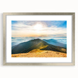 Framed wall art featuring a serene mountain landscape design with a silver mat, showcasing vibrant colors and intricate details, perfect for home decor.