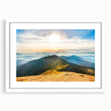 Framed landscape wall art depicting majestic mountains, featuring a white mat and sleek frame, ideal for modern home decor and interior design enthusiasts.