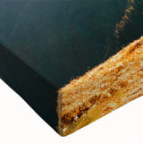 Close-up of a vibrant stretched canvas wall art featuring majestic mountain landscapes in rich colors, ideal for home decor and nature enthusiasts.