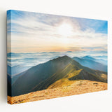Stretched canvas wall art featuring a vibrant mountain landscape design in rich colors, showcasing majestic peaks and serene skies, perfect for home decor.