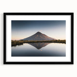 Framed wall art featuring a stunning mountain landscape design, presented with a black frame and mat, perfect for home decor enthusiasts seeking nature-inspired aesthetics.