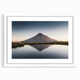 Framed wall art showcasing a stunning mountain landscape design with vibrant colors, set against a white mat and frame, perfect for home decor.