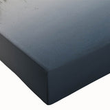 Close-up of a stretched canvas wall art piece showcasing a breathtaking mountain landscape, featuring rich colors and intricate details, perfect for enhancing any room's decor.