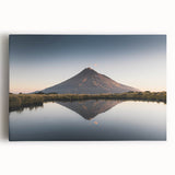 Stretched canvas wall art depicting a vivid mountain landscape with blue skies and lush greenery, ideal for home decor in living rooms or offices, enhancing nature-themed aesthetics.