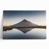 Stretched canvas artwork of a serene mountain landscape, featuring vibrant colors and textured details, perfect for home decor and enhancing interior spaces.
