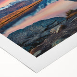 Stunning rolled canvas showcasing a vibrant landscape of majestic mountains under a clear blue sky, perfect for home decor and art enthusiasts, packaged securely for delivery.