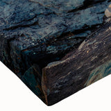 Close-up of a stretched canvas showcasing a vibrant mountain landscape design, with rich colors and intricate details, perfect for home decor or office art.