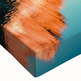 Close-up of a stretched canvas showcasing a vibrant mountain landscape design in rich blues and greens, perfect for home decor or wall art collection.