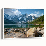 Framed canvas artwork featuring a stunning mountain landscape design in soft colors, ideal for home decor. The piece showcases serene peaks and a tranquil atmosphere, perfect for nature lovers.