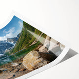 Rolled print of a stunning mountain landscape featuring vibrant colors and intricate details, ideal for home decor. Packaged securely in a cardboard tube for safe delivery.